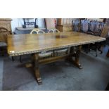 A Nigel Griffiths carved oak refectory table