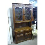 A carved oak dresser