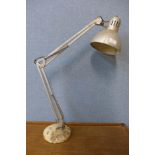 An industrial anglepoise desk lamp