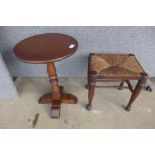 An Old Charm oak wine table and a rush seated stool