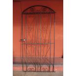 A wrought iron garden gate