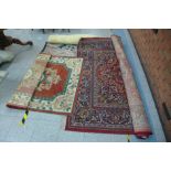 Three assorted rugs