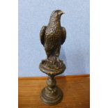 A French style bronze figure of a bird of prey, 41cms h