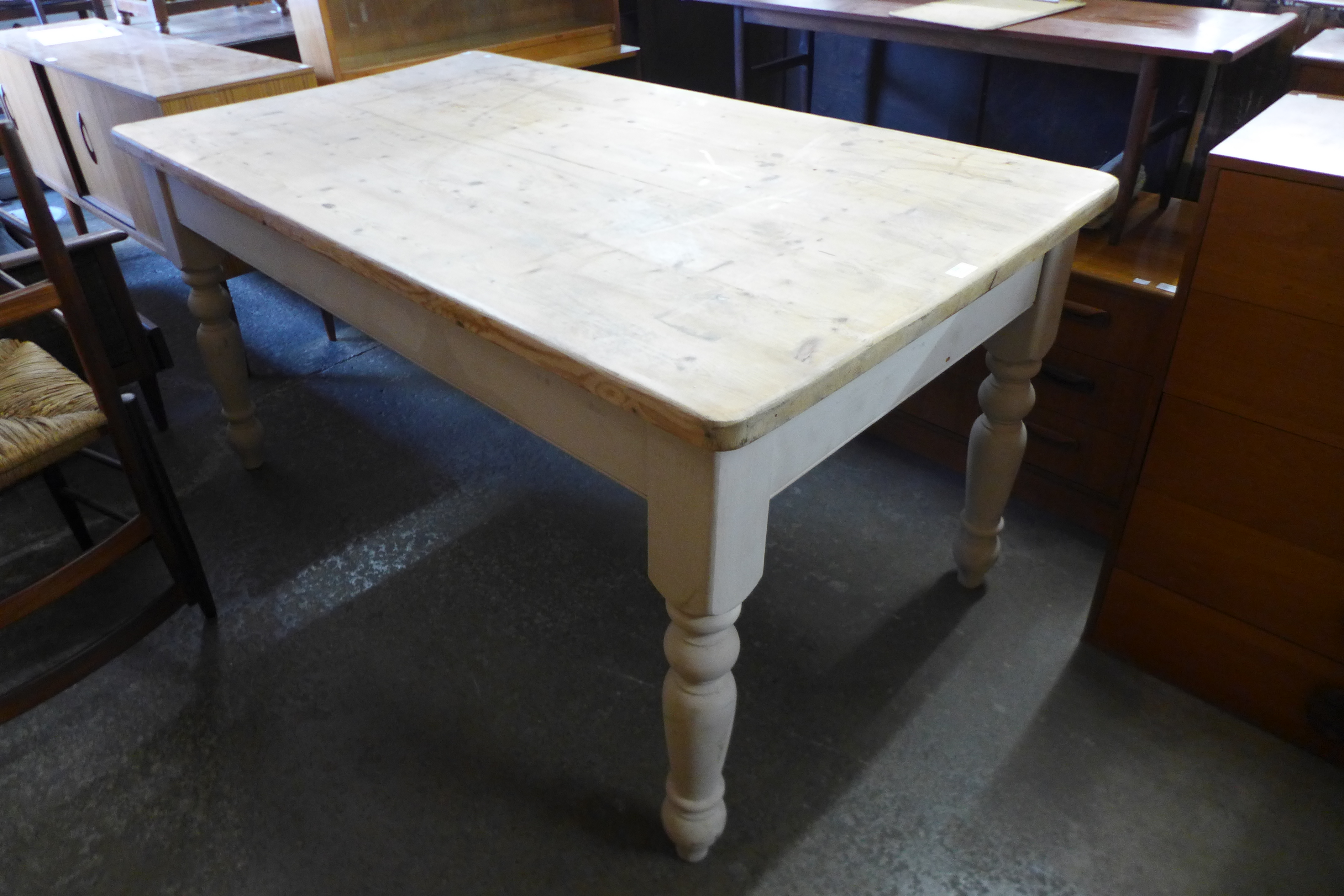 A painted pine farmhouse kitchen table