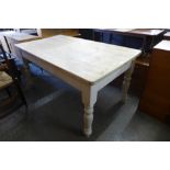 A painted pine farmhouse kitchen table