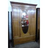 An Edward VII inlaid mahogany wardrobe