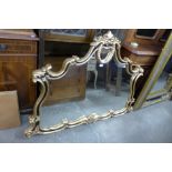 A large French style ebonised and parcel gilt framed mirror, 108 x 150cms