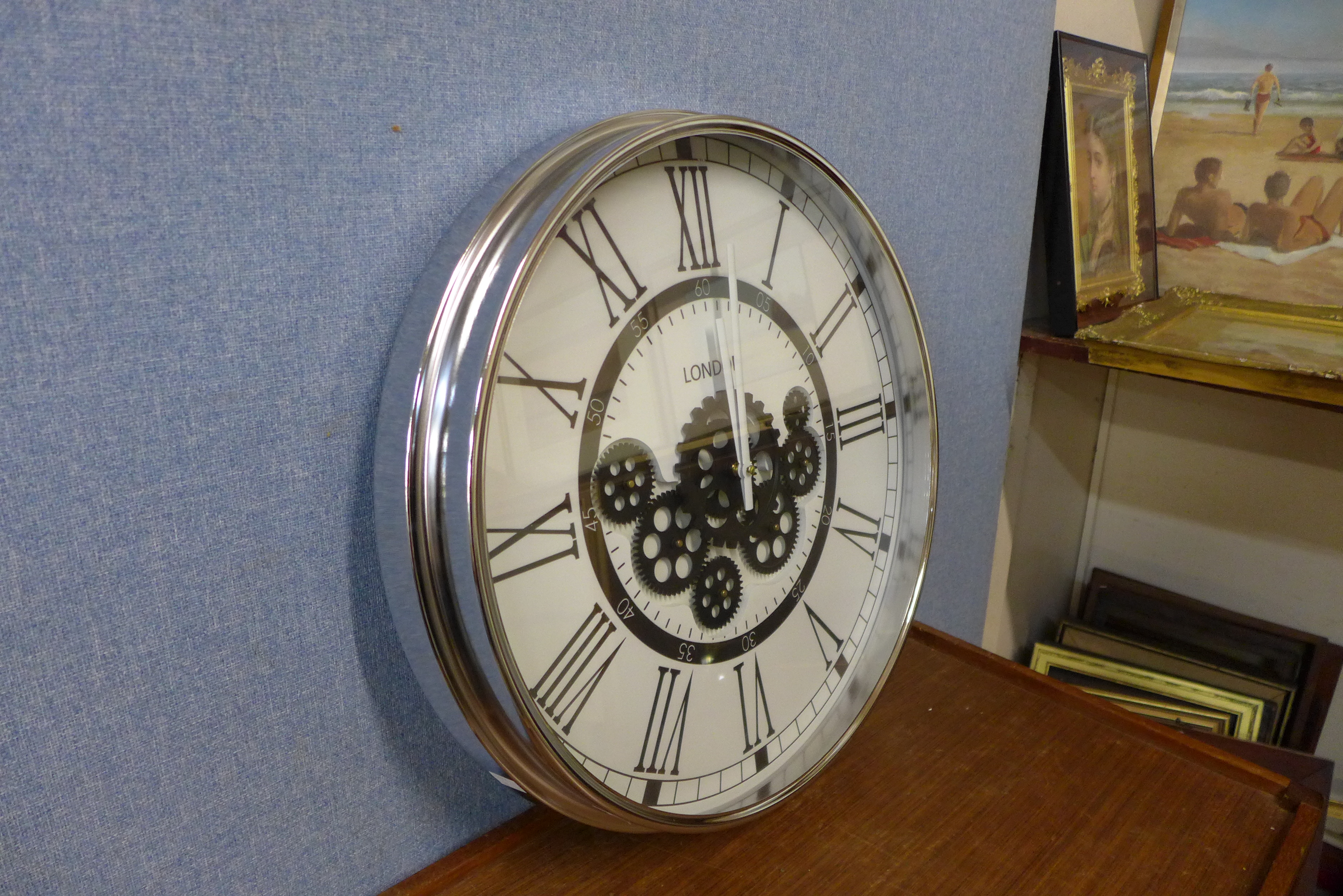 A contemporary circular skeleton wall clock - Image 2 of 2