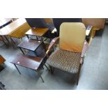 A teak elbow chair and three occasional tables