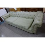 A Victorian mahogany and fabric upholstered Chesterfield settee