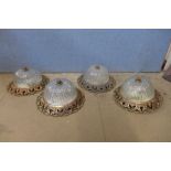 A set o four glass and gilt metal ceiling lights