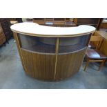A simulated rosewood Formica bar