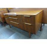 A small teak sideboard