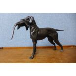 A bronzed figure of a retreiver, 23cms h