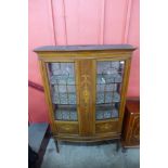 An Edward VII inlaid mahogany display cabinet