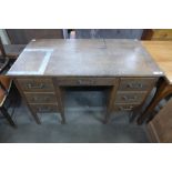 An early 20th Century oak desk