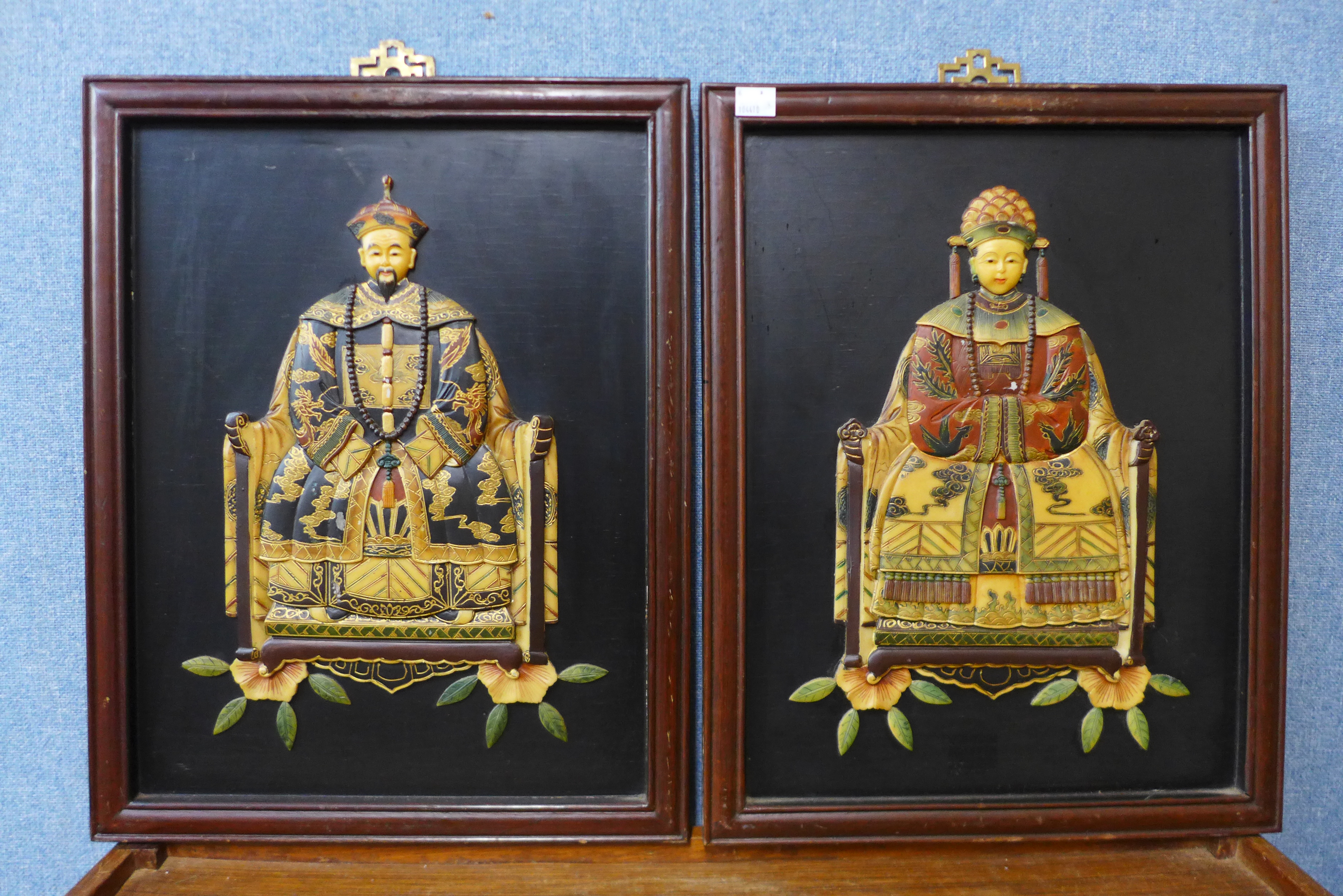 Two Japanese reverse oil paintings on glass and a pair of relief plaques, depicting Emperors - Image 2 of 2