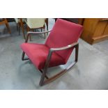 A Danish teak and upholstered rocking chair