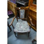 An Edward VII inlaid beech elbow chair