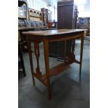 An Arts and Crafts oak rectangular occasional table