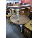 Two painted mahogany dining tables and a painted oak refectory table