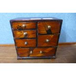 A small Japanese inlaid elm kodansu cabinet, 19cms h