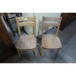 A pair of oak child's chairs