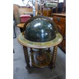 A terrestrial globe cocktail cabinet