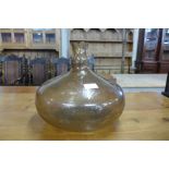 A vintage smoke glass bulbous vase