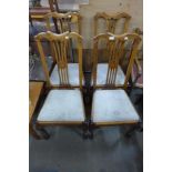 A set of four Edward VII beech dining chairs