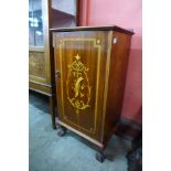 An Edward VII inlaid mahogany music cabinet