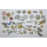 Forty-seven vintage brooches