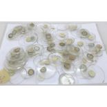 Approximately 100 pocket watch glasses