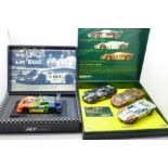 Two Le Mans vehicle sets, 1998 LM 600 vehicle, Le Mans 1966 three-vehicle set 2003, both boxed