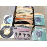 A box of 7" vinyl singles, five The Beatles, four The Rolling Stones plus other 1960's and 1970's