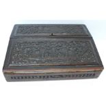 An Anglo-Indian carved wooden writing box, lacking inkwells