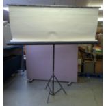 A large free-standing projector screen measuring 270cm H x 240 W (height including stand)