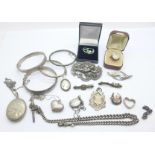 A collection of silver and white metal jewellery including a Charles Horner shamrock brooch,