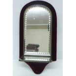 A Victorian etched wall mirror bracket with red velvet surround