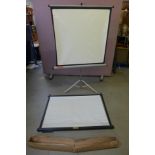 A free-standing projector screen and a table-top Raybrite cine screen