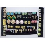 Thirty-five pairs of vintage clip-on and screw back earrings