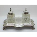 A Victorian silver inkstand with two inkwells, London 1883, Walter & John Barnard, width of base