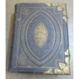 A large family Holy Bible with gilt metal clasps