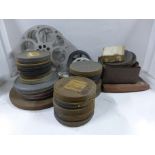 30 16mm & 8mm films and spare reels including 'The Air Road to Gold' and the Mills/Bakst fight.