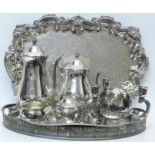 A silver plated gallery tray, a four piece tea service and a centre-piece, all by Viners, and one