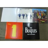 Five Beatles LP records, re-issues