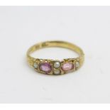 A Victorian 15ct gold, amethyst and pearl ring, 1.6g, M, (a/f, shank repaired, one stone replaced)