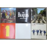 Six Beatles LP records, re-issues