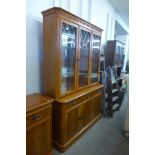 A yew wood breakfront sideboard and matching wall unit