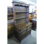 An Old Charm carved oak linenfold dresser